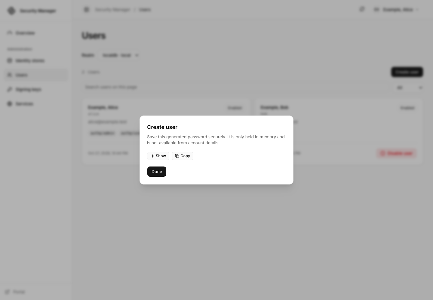 Successful user creation with the generated password protected behind explicit reveal and copy controls.