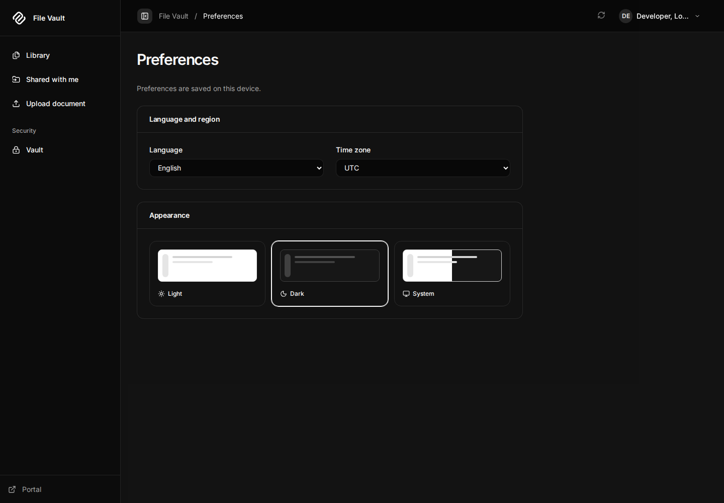File Vault Preferences in dark appearance with language and timezone controls.