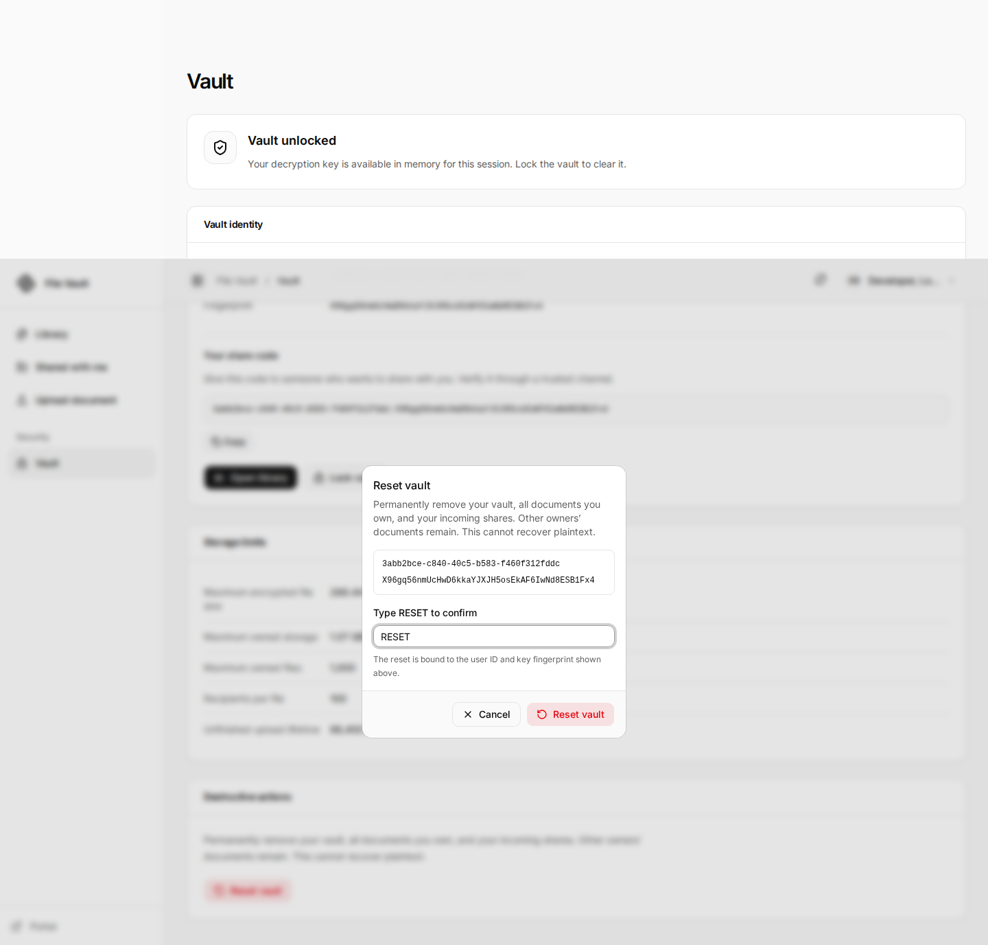 Reset vault dialog showing the account and key fingerprint and the typed RESET confirmation.