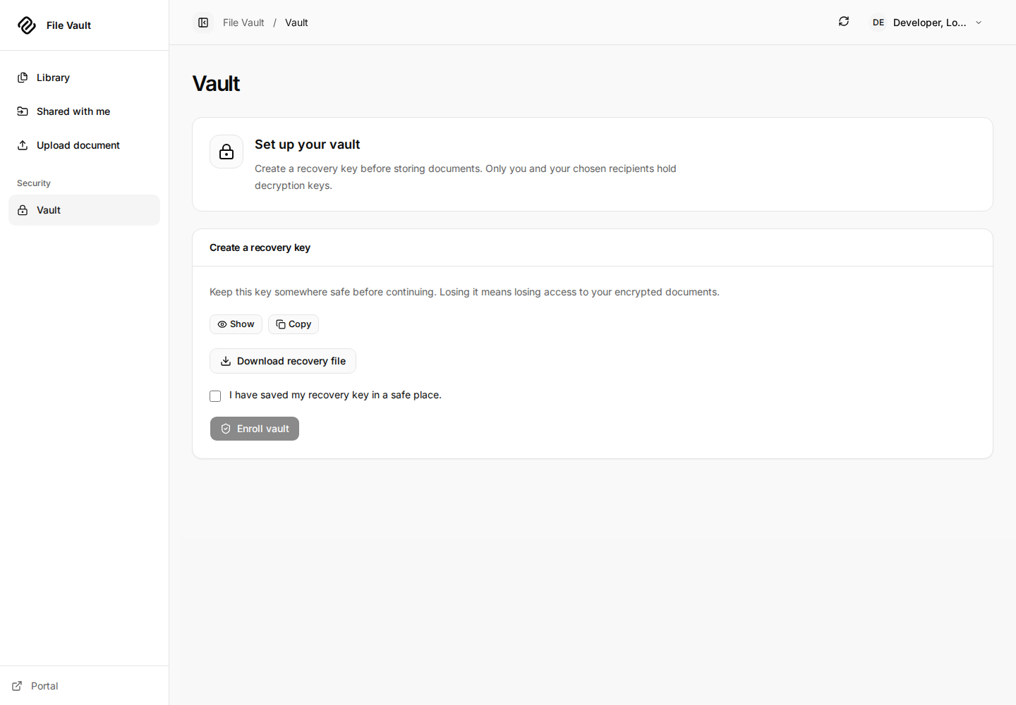 Vault enrollment with a protected recovery key, Download recovery file, backup acknowledgement, and disabled Enroll vault action.